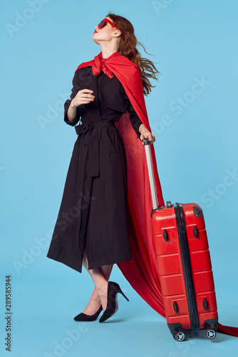 young woman with suitcase