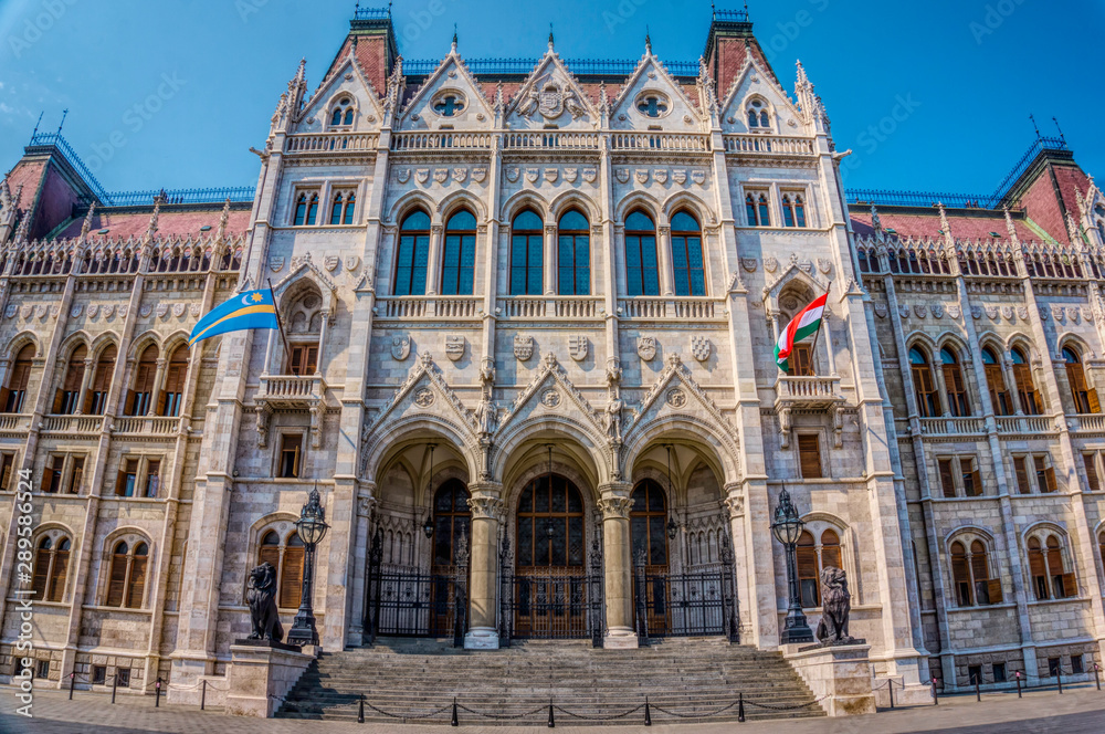 Budapest, Hungary - August 29, 2019:Hungarian Parliament building in the city of Budapest. A sample of neo-gothic architecture, Budapest's tourist attraction