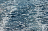 Wave pattern on the water surface of behind boat, background. Adriatic Sea