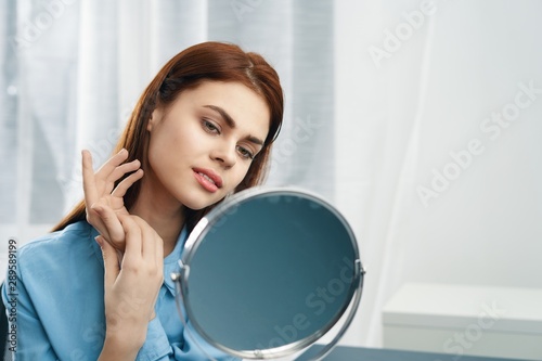 portrait of young woman in bathroom