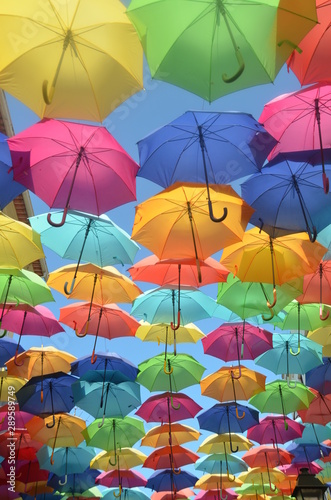 Covered by colorful umbrellas