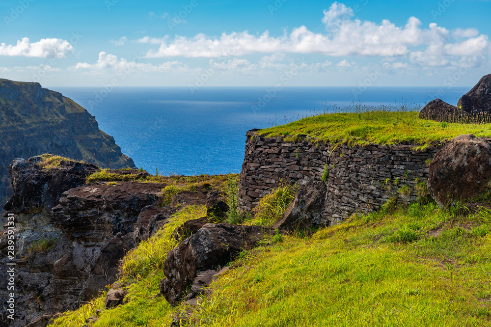 Construction located in the ceremonial and religious center of Orongo by the Rano Kau volcanic crater and the Pacific Ocean on Rapa Nui (Easter Island), Chile.