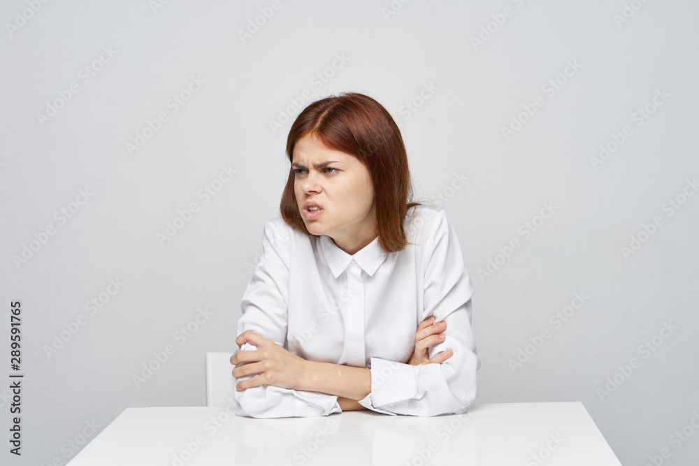 business woman sitting at desk with laptop business woman sitting at desk with laptop