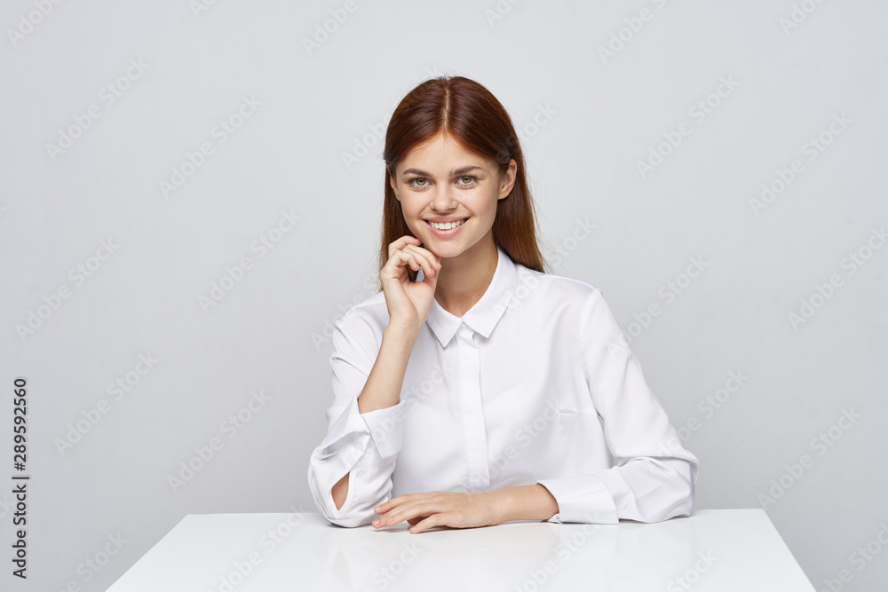 business woman sitting in office business woman sitting in office