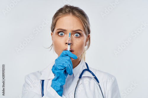 young doctor with stethoscope photo