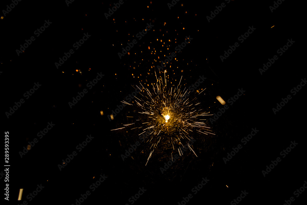 Sparks of a fire during the night, black background. Sparks of a fire during the night, black background.