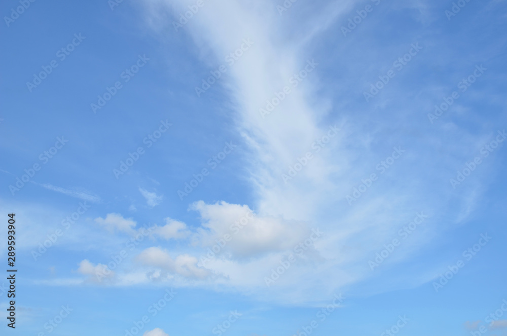 Subtle pastel background of clouds in blue sky Subtle pastel background of clouds in blue sky