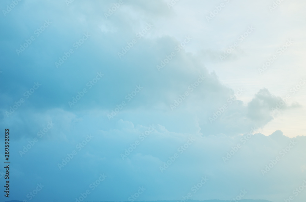 Subtle pastel background of clouds in blue sky Subtle pastel background of clouds in blue sky