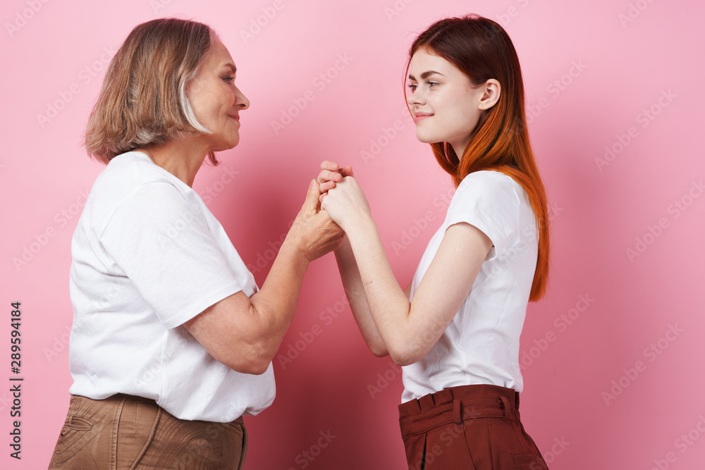 two girls talking on the phone