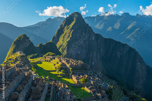 Close up of the Machu Picchu, the lost city of the Inca, at sunset with the last sun rays shining on the ruin, located in the Urubamba valley near Cusco, Peru, South America.