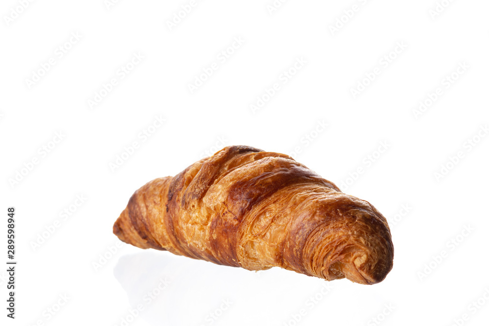 Classic french croissant on a white background. Homemade baking. Classic french croissant on a white background. Homemade baking.
