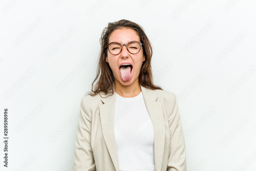 Φωτογραφία Young european business woman funny and friendly sticking out her tongue