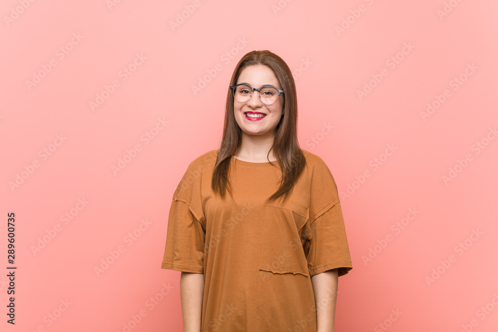 Young student woman wearing eyeglasses happy, smiling and cheerful. Young student woman wearing eyeglasses happy, smiling and cheerful.