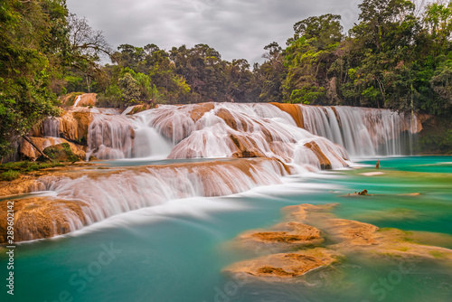 The magnificent cascades and waterfalls of Agua Azul in the tropical rainforest of the Chiapas state near Palenque, Mexico. photo