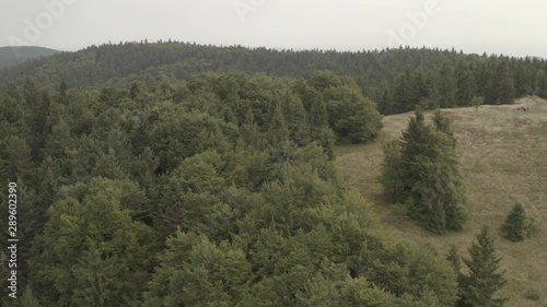 aerial view over mountains in Velke karlovice beskydy czech, This clip is available in two different gradings , 10bit color or dji color lut  photo