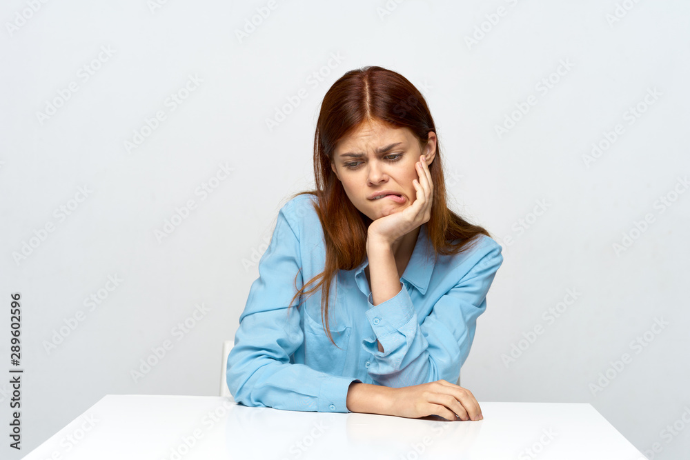 portrait of young woman sitting on floor portrait of young woman sitting on floor