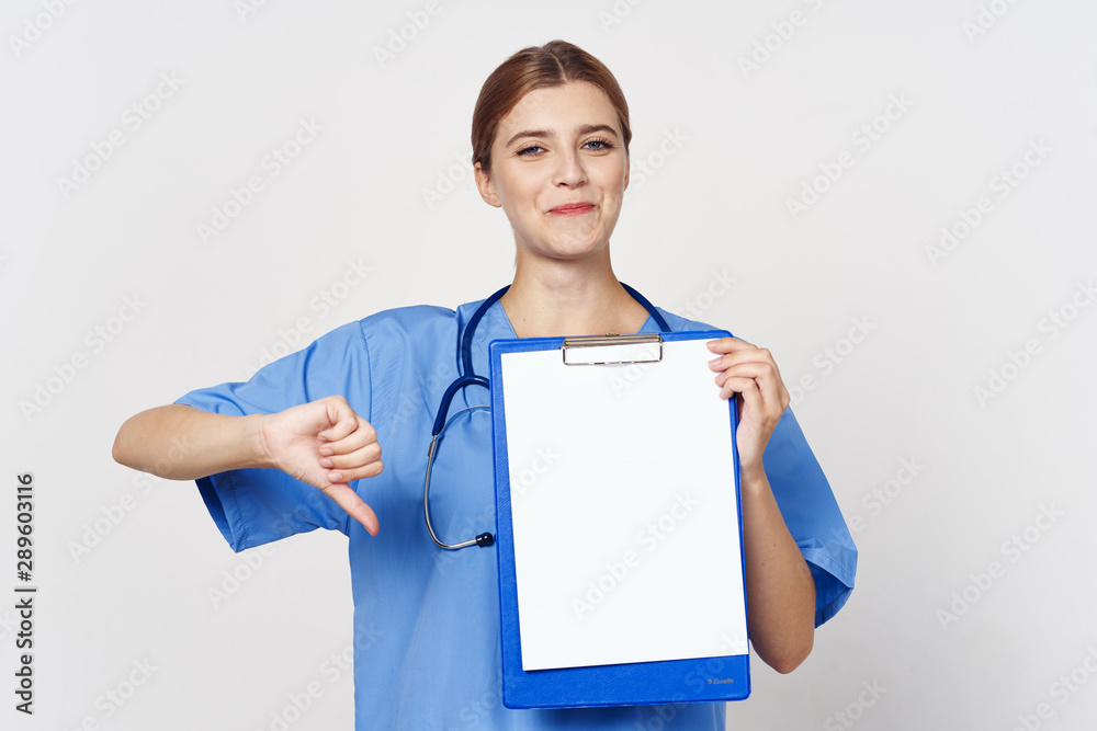 young female doctor with clipboard