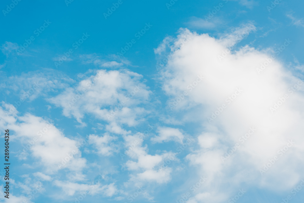 blue sky with fluffy clouds and copy space