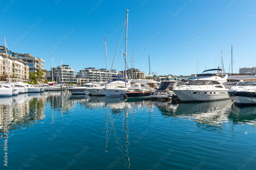 Reflection of the yacht marina in Cape Town on a summer day, Western Cape province, South Africa.