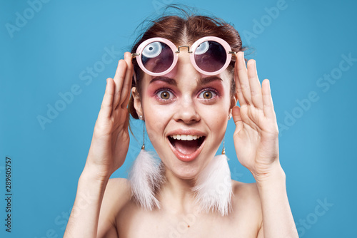 portrait of young woman in sun glasses