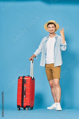 young woman with suitcase