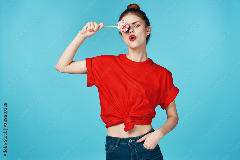 Fototapeta premium young man in red shirt and blue jeans