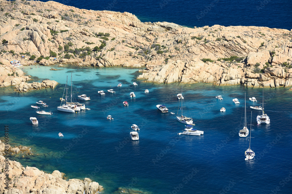 Obraz premium View from above, Stunning aerial view of Cala Coticcio also known as Tahiti with its rocky coasts and small beaches bathed by a turquoise clear water. La Maddalena Archipelago, Sardinia, Italy.