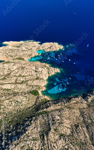 Stunning panoramic view of Cala Coticcio also known as Tahiti with its rocky coasts and small beaches bathed by a turquoise cllear water. La Maddalena Archipelago, Sardinia, Italy. photo