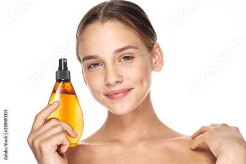 woman with glass of orange juice