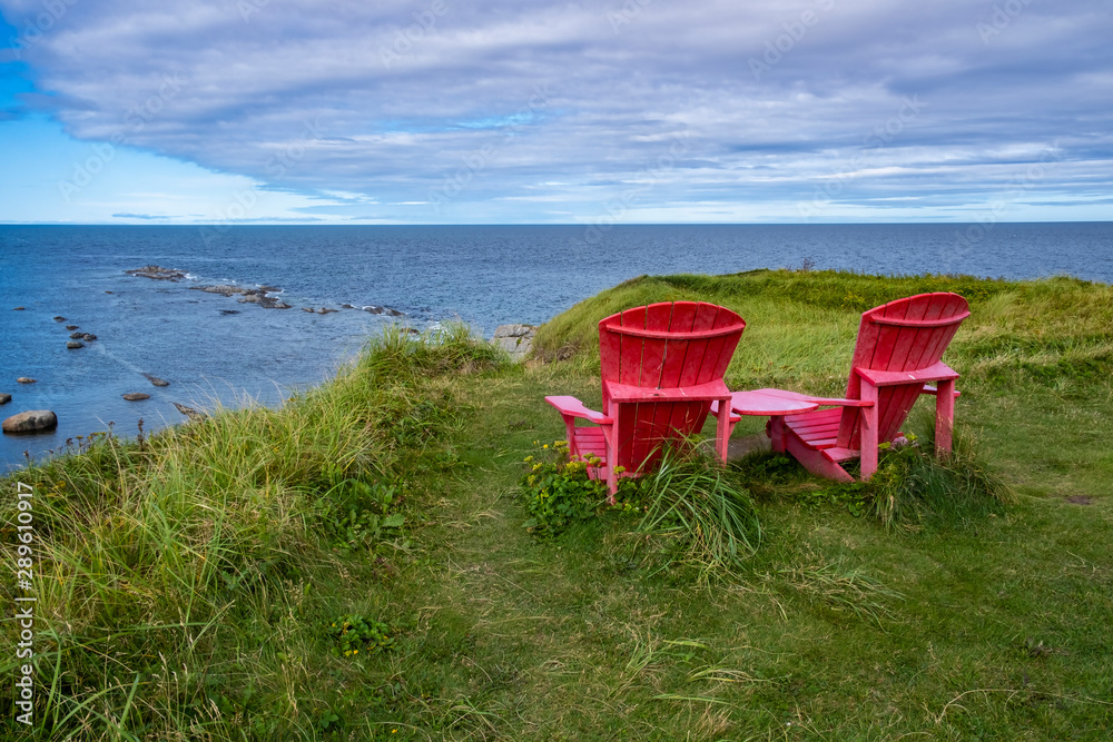 Two Red Adirondack Chairs at Green Point, Overlooking the Gulf of St. Lawrence, Newfoundland