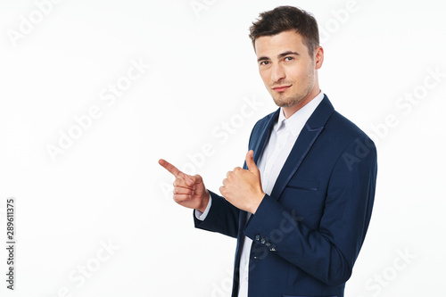 young businessman showing blank business card