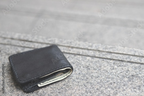 wallet with credit cards on black background