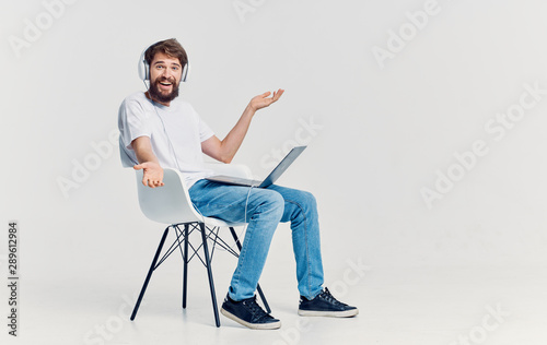 young man sitting on a chair