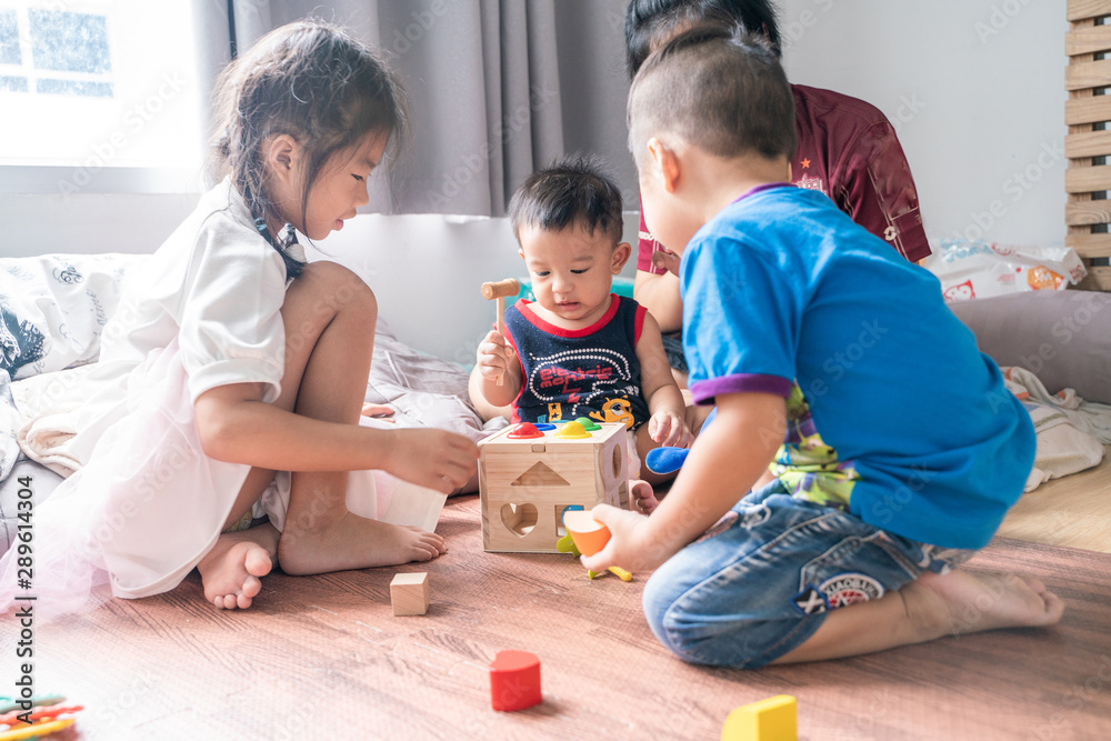 Group of lottle kid friend playing toy together Group of lottle kid friend playing toy together
