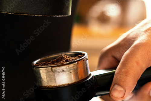 macro shot of a ground coffee beans,brewing process, morning routines