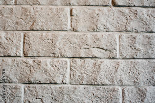 White brick vintage background. cracked old wall