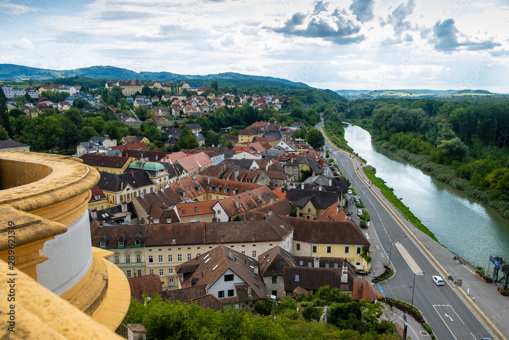 the historic Melk Abbey, view of the town of Melk and an arm of the Danube River