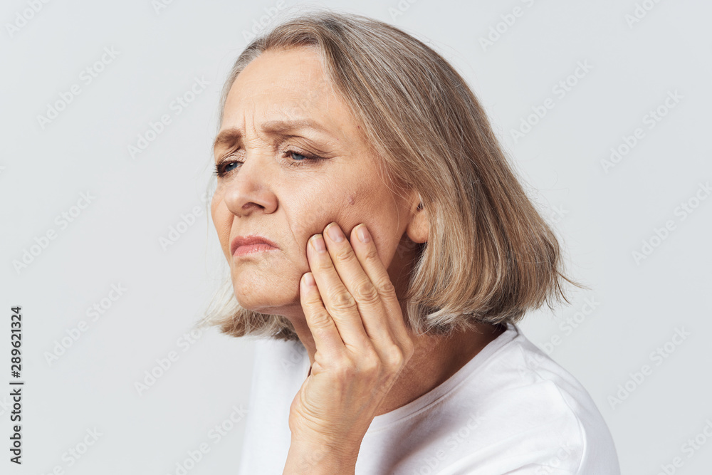 young woman covering mouth with her hands young woman covering mouth with her hands
