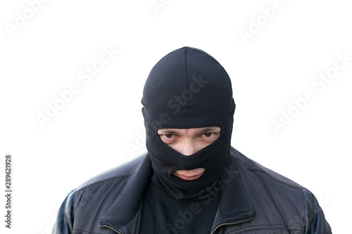 criminal in a black balaclava on an isolated background