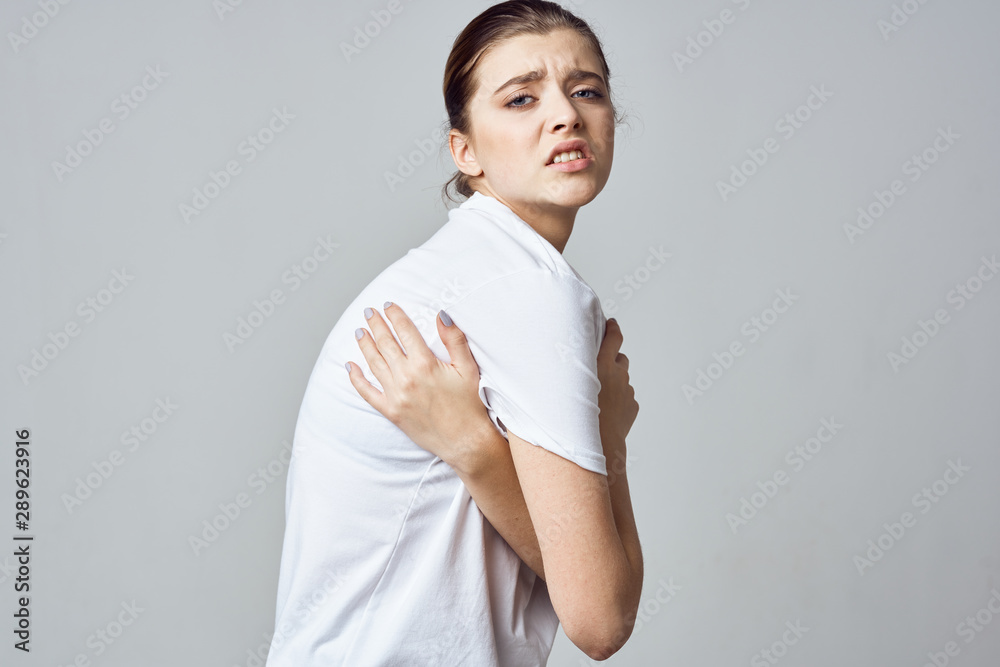 portrait of a young woman with thumbs up