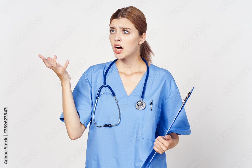 portrait of a female doctor with stethoscope isolated on white portrait of a female doctor with stethoscope isolated on white