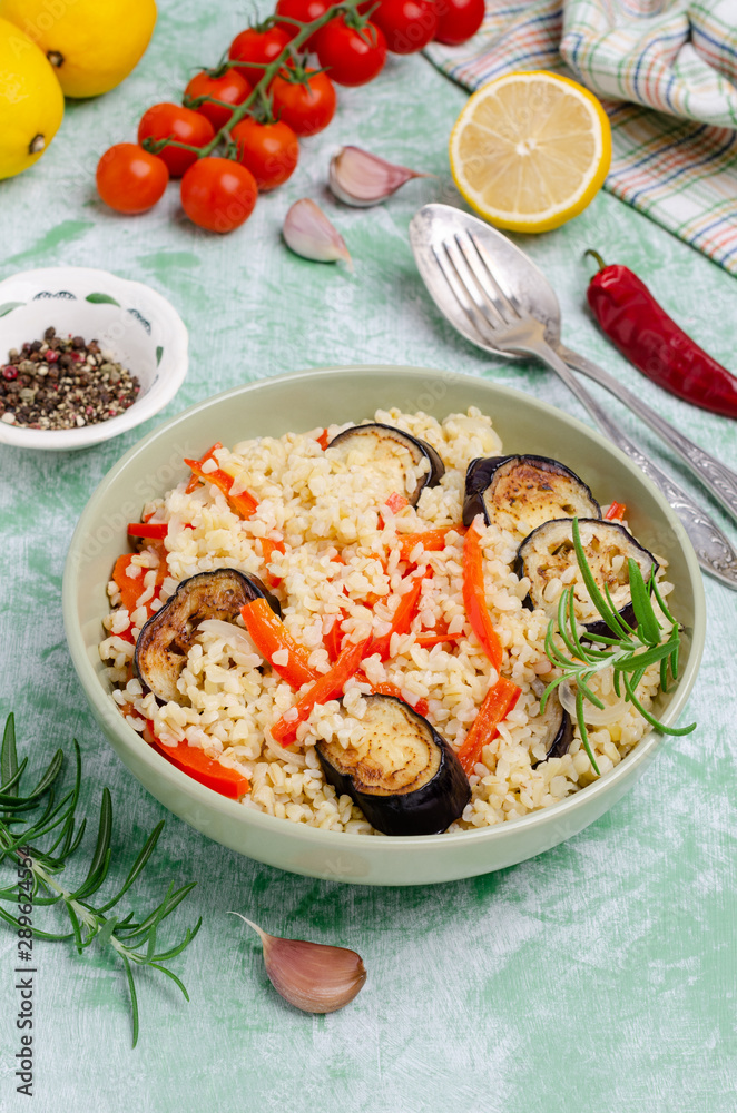 Bulgur with slices of fried vegetables