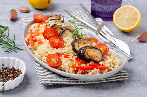 Bulgur with slices of fried vegetables