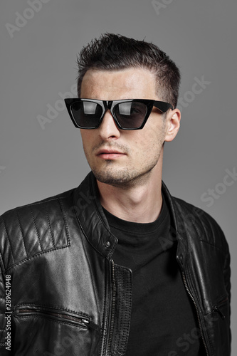 portrait of young man in sunglasses