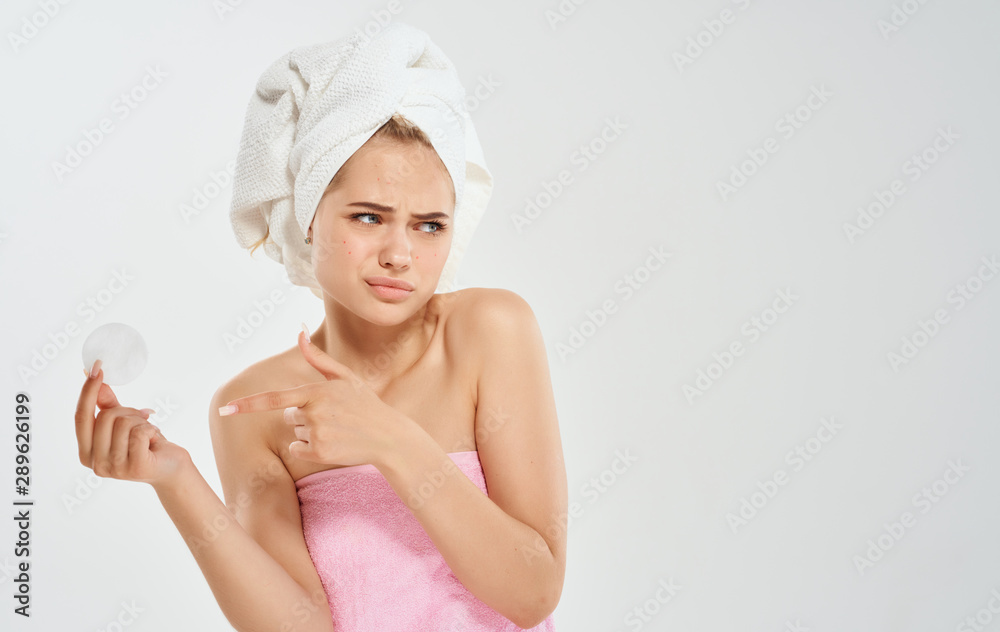 Beautiful woman with a towel on her head Beautiful woman with a towel on her head