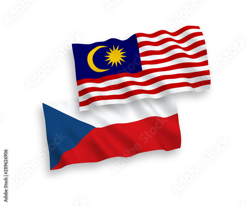 National vector fabric wave flags of Czech Republic and Malaysia isolated on white background. 1 to 2 proportion.