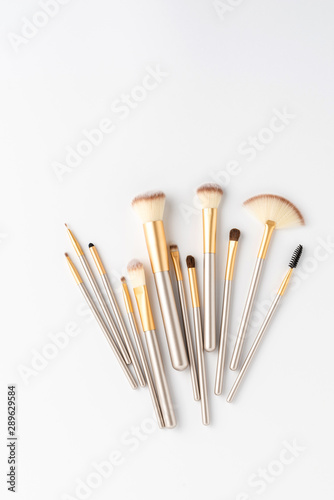 Makeup brushes set isolated on white background. Top view