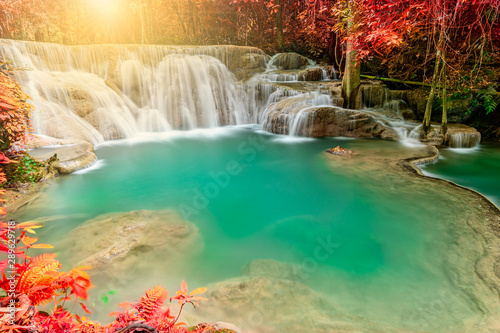 Forest in autumn with river and waterfalls. There are beautiful rivers and waterfalls in the autumn forest. Wild Autumn with beautiful rivers and waterfalls.