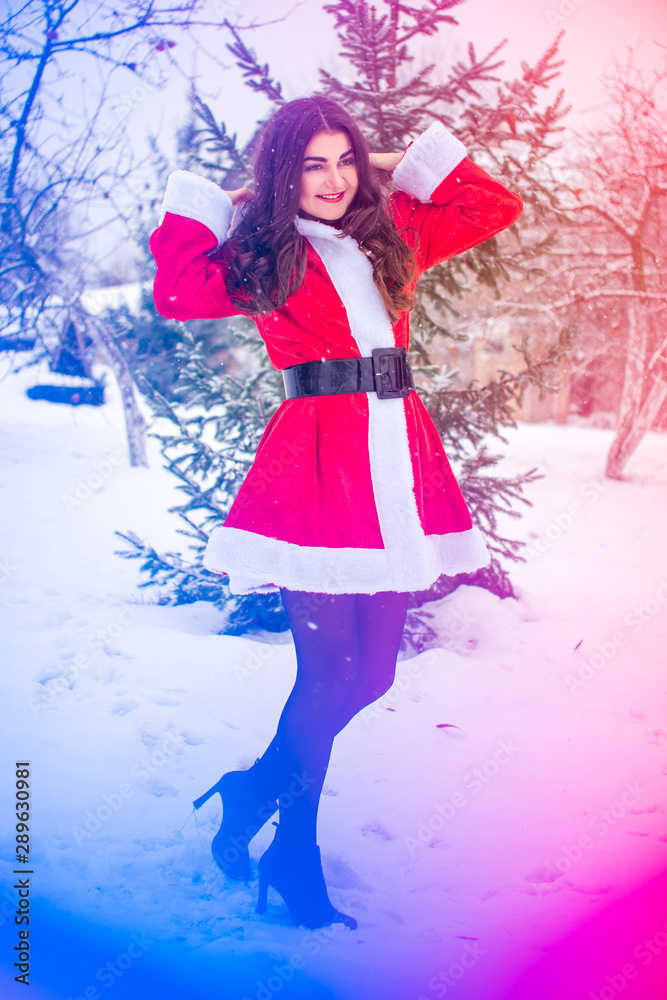 Arabic Santa girl at winter holidays, girl in costume Arabic Santa girl at winter holidays, girl in costume