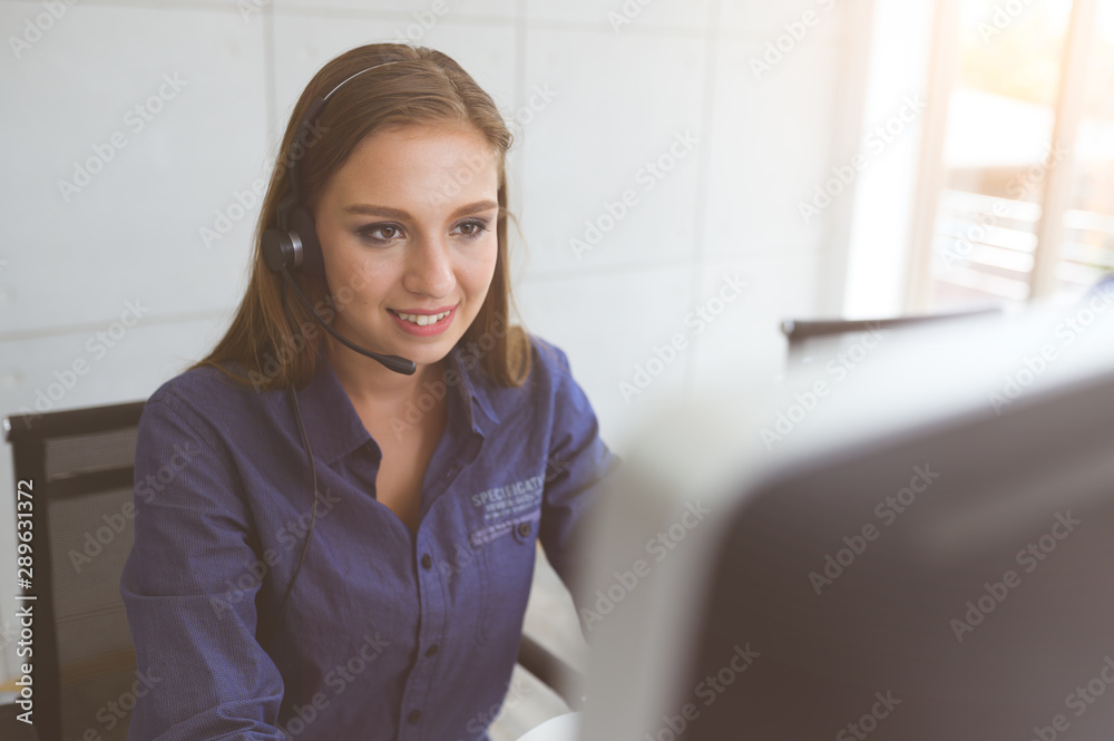 Call Center Service. Photo of customer support or sales agent. Help line answering and telemarketing. Female caller or receptionist phone operator.Copy space for some text, advertising or slogan. Call Center Service. Photo of customer support or sales agent. Help line answering and telemarketing. Female caller or receptionist phone operator.Copy space for some text, advertising or slogan.